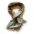Scarf with nature-themed design on a white background