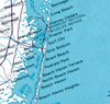 A close-up printed map showing coastal place names such as Barnegat, Long Beach, Surf City, Ship Bottom, and Beach Haven Heights over a light blue water area with white land and black road lines.