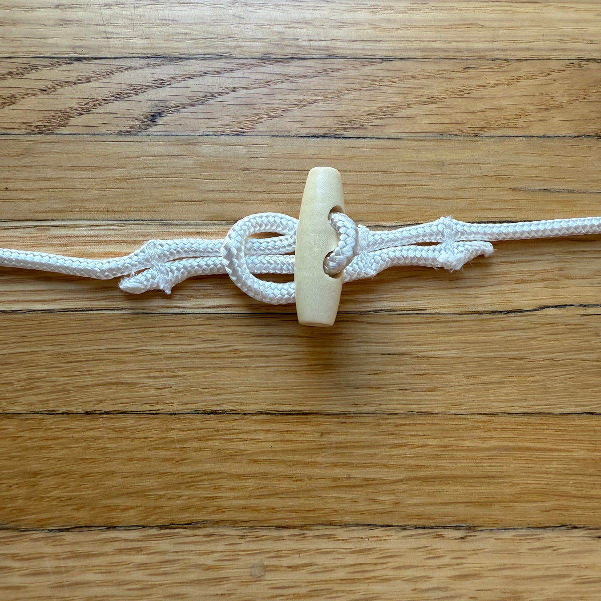 A Spacer for the Flags: Cordage, loop and toggle - Maritime Tribes USASignal Flag